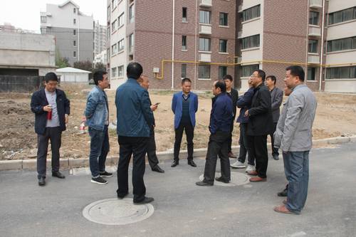 銅煤公司承建的銅煤2#小區(qū)水仙居5、6、7、8#樓順利通過竣工驗收